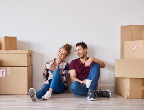 couple sitting in new home