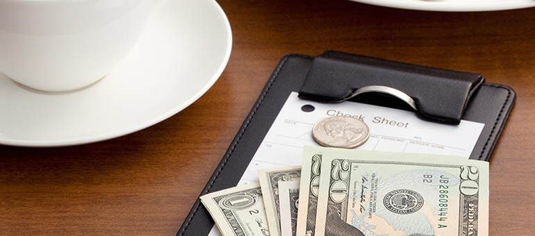 Restaurant ticket with money
