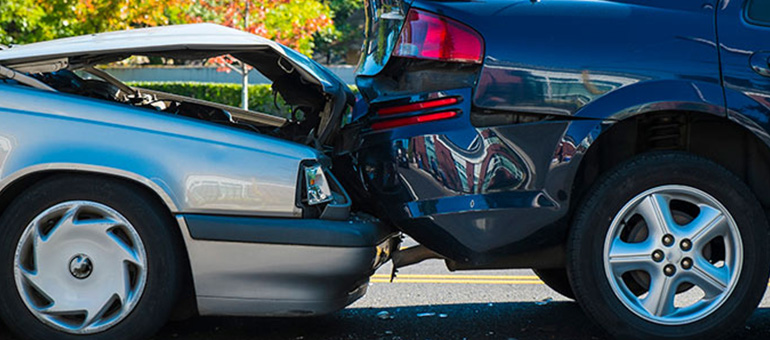 One car crashing into another car.